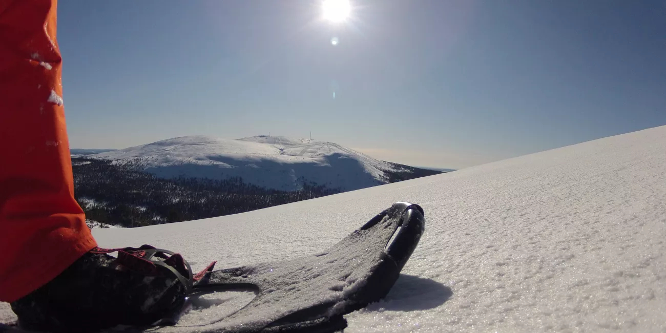 Snowboarder on the top of the mountain