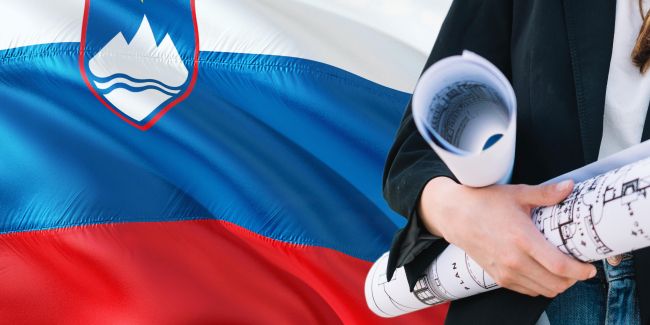 slovenian flag woman holding plans