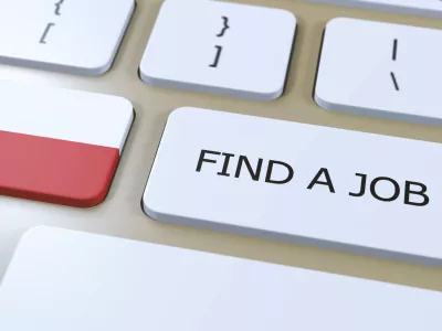 Keyboard with the Polish flag and the words find a job