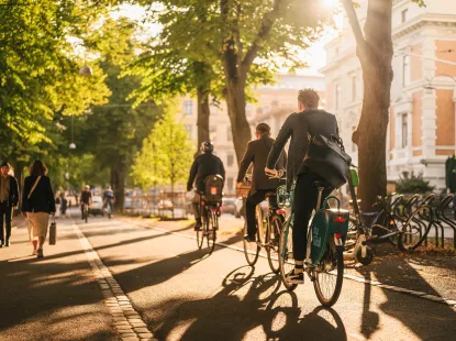 people in suits cycling in the park