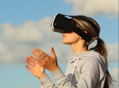 Woman Using Vr Goggles Outdoors
